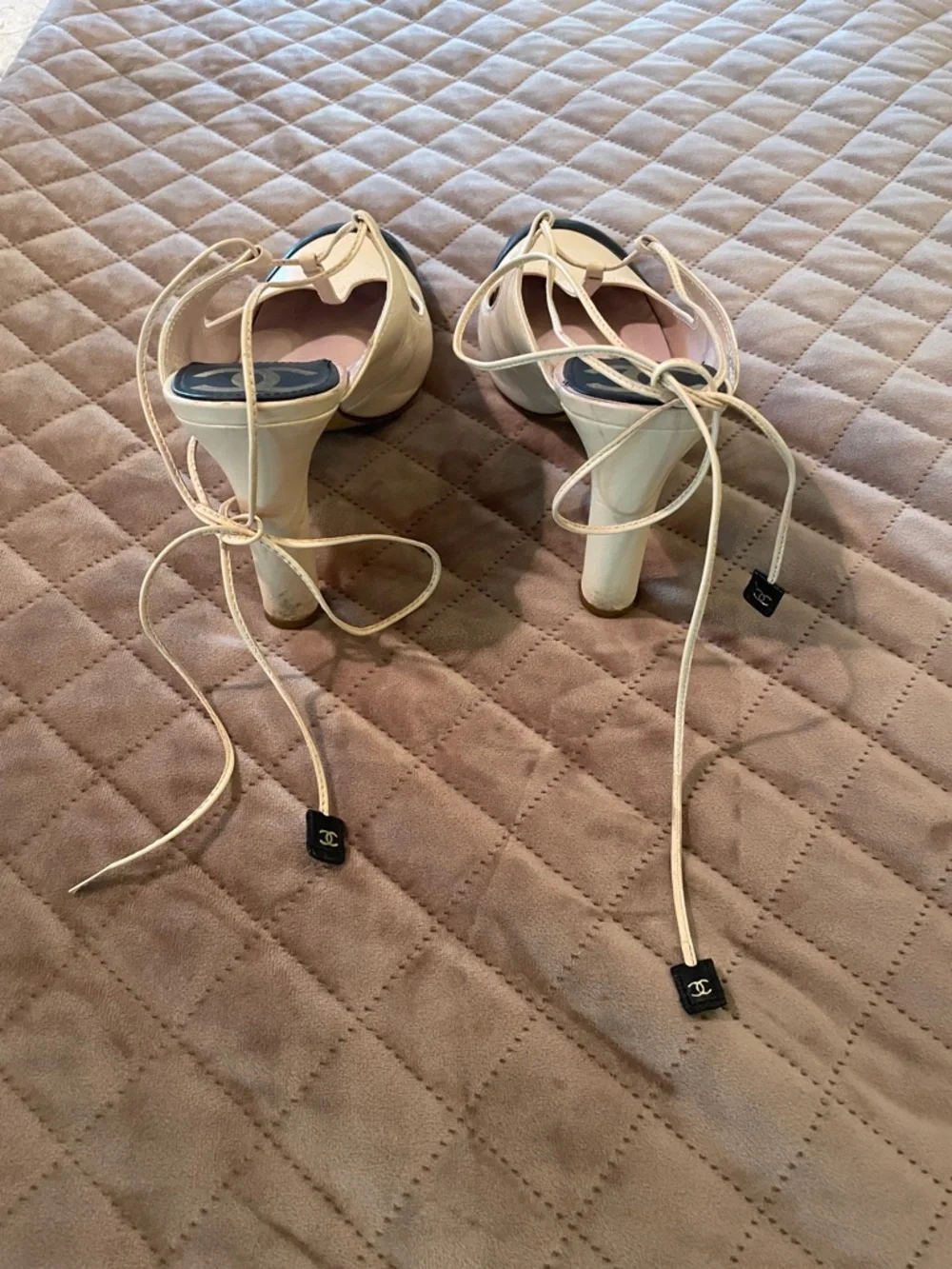 CHANEL Two-Tone T-Strap Pumps in Cream and Black with Logo Heel